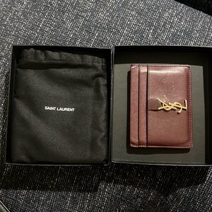 YSL maroon colored wallet. With original box and dust bag